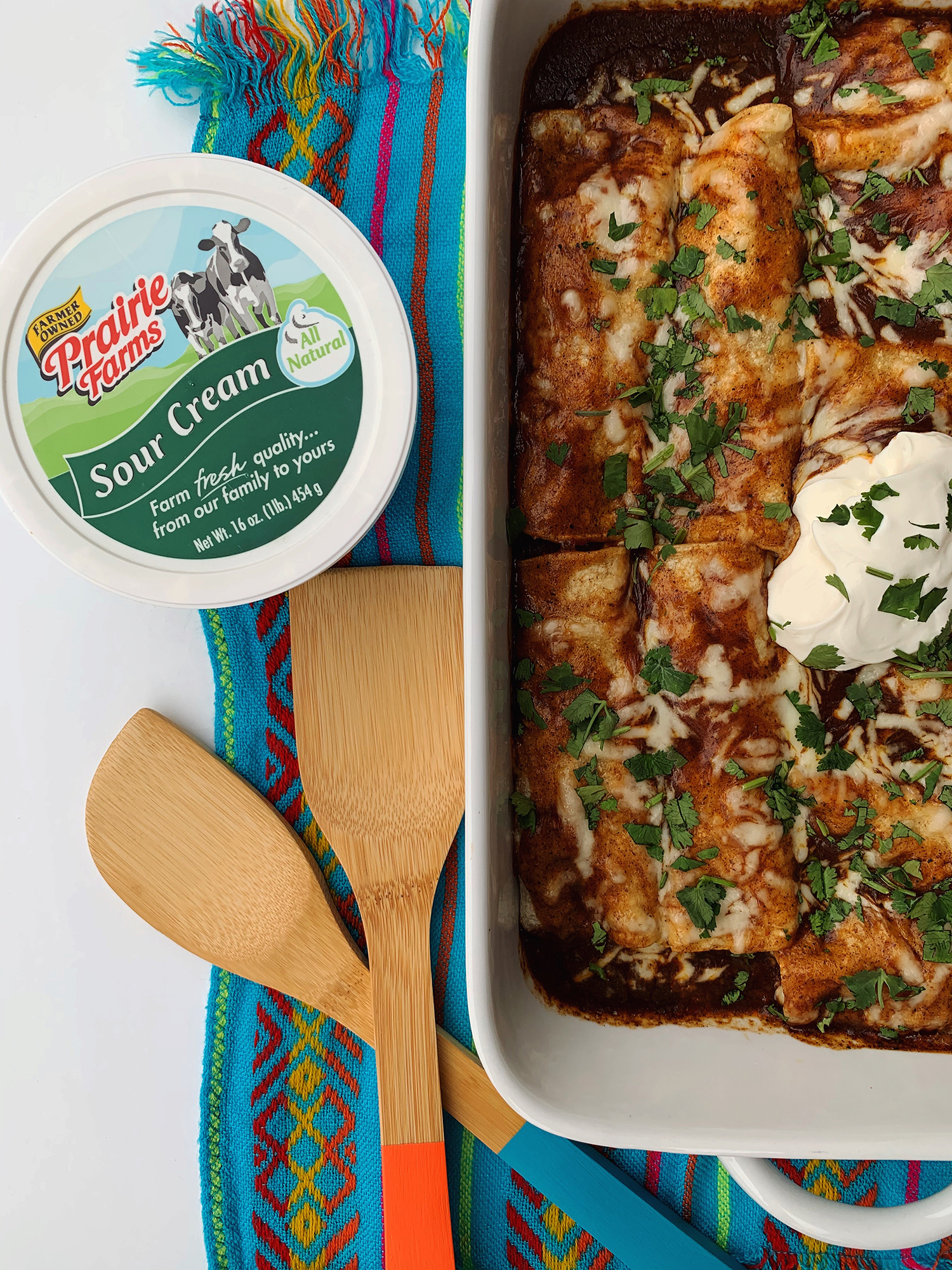 Enchiladas rojas with Prairie Farms sour cream is the perfect