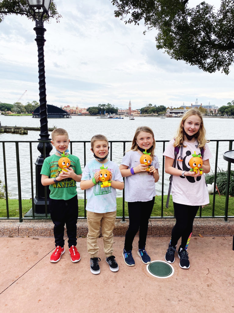 How to plan a Disney Vacation: four kids with Dole Whips in Disney