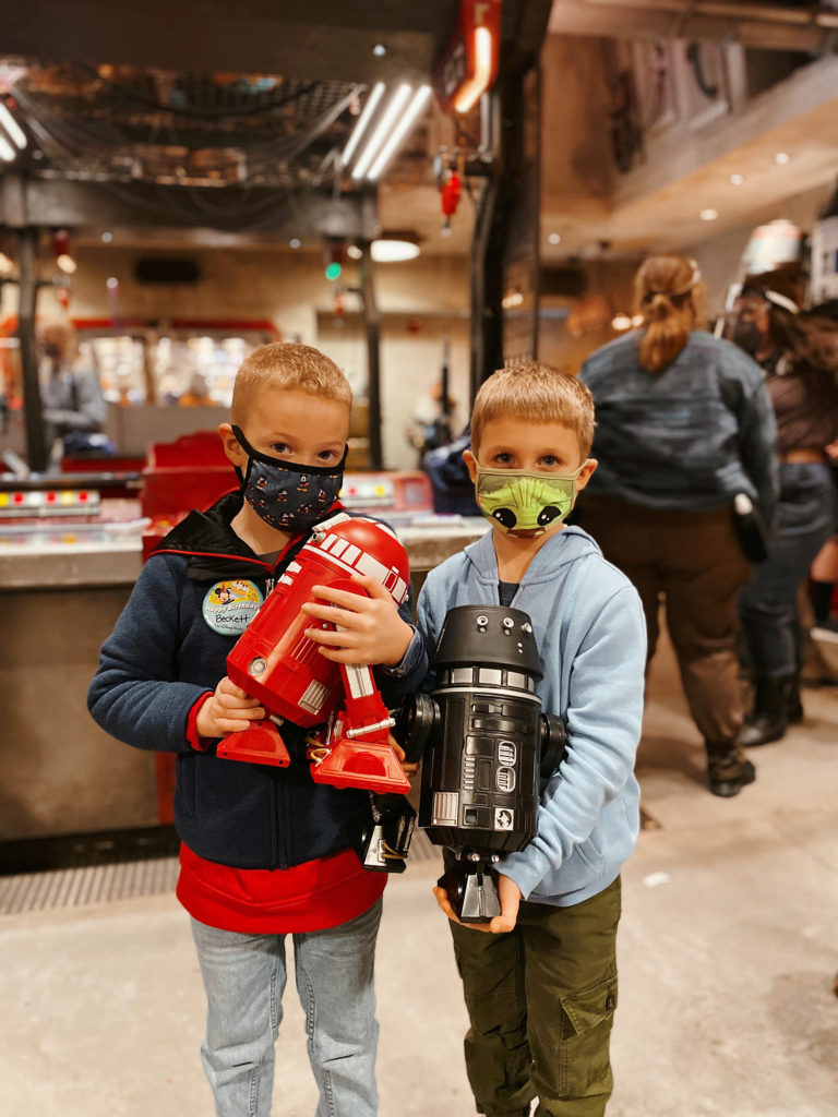 How to plan a Disney Vacation: Two boys making Droids in Hollywood Studios in Disney